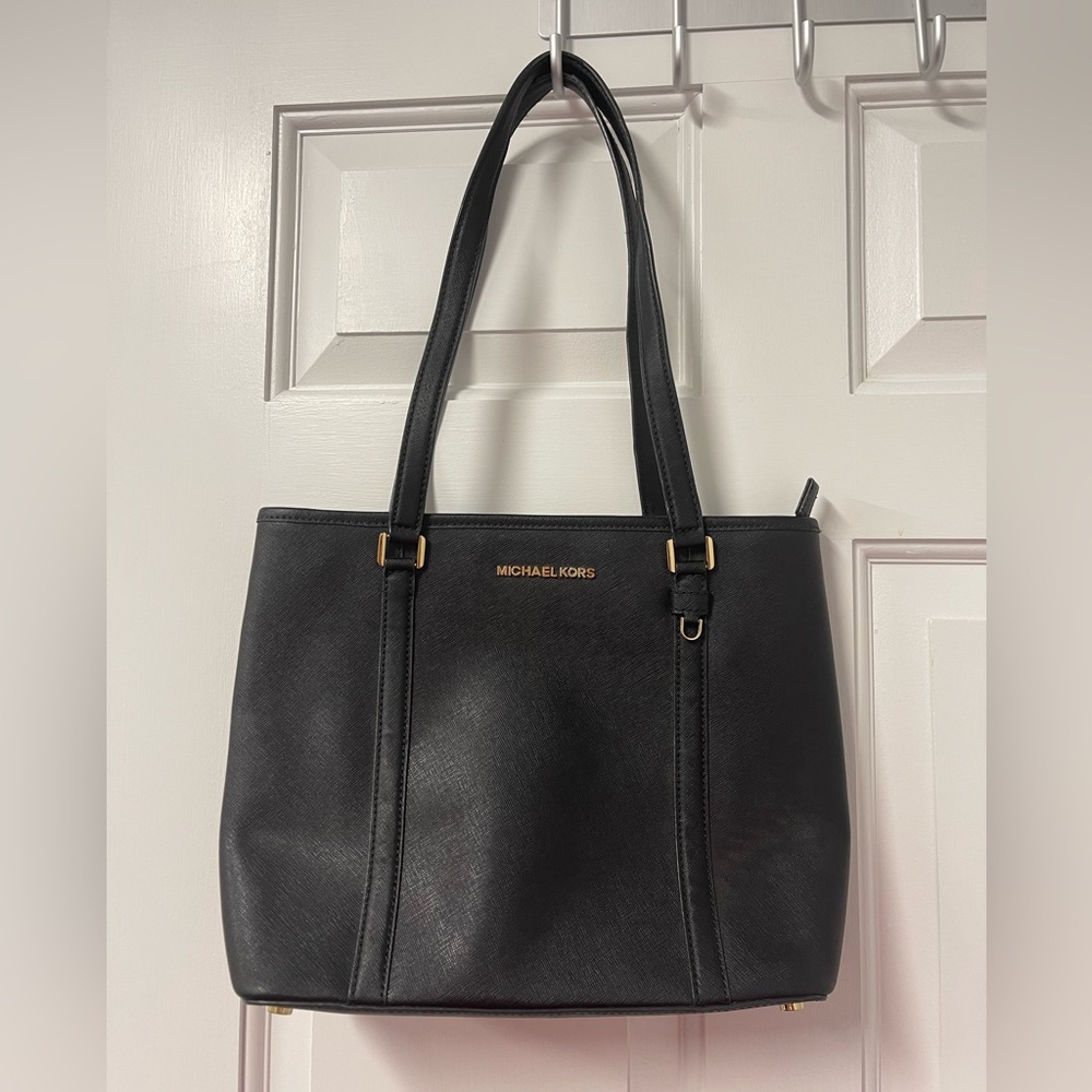 Good used condition Michael Kors black leather medium size tote purse